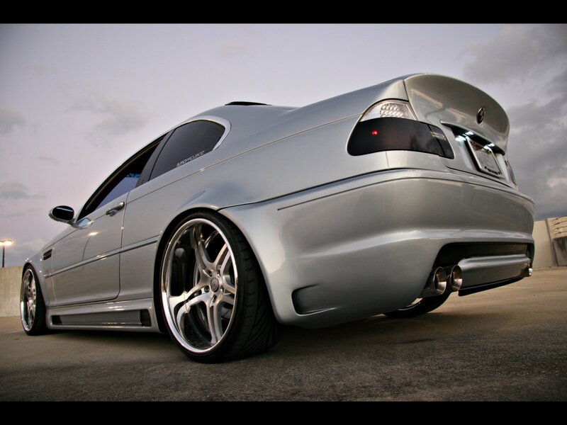 silver bmw coupe with custom wheels