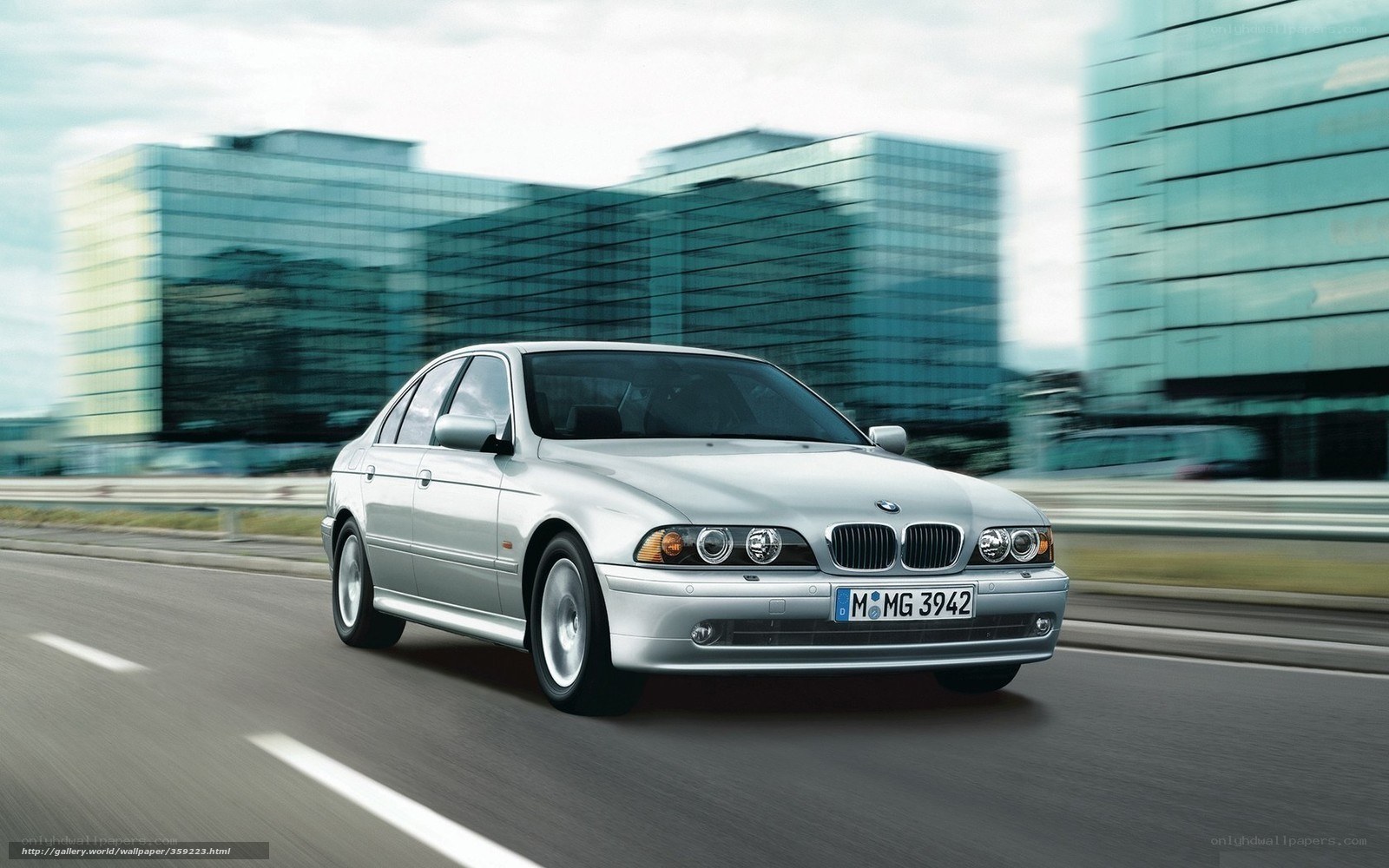 silver bmw driving on highway