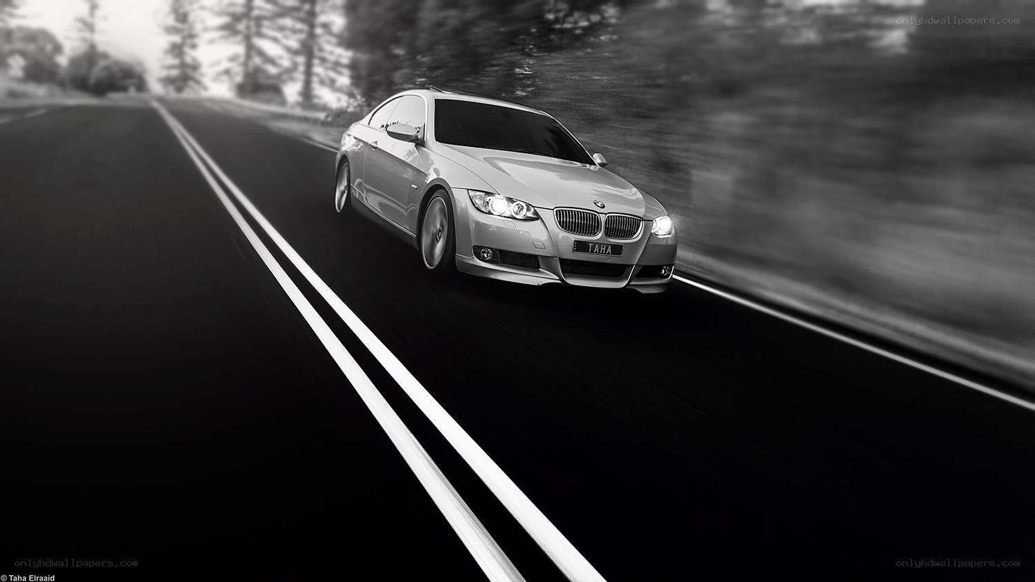silver bmw driving on road