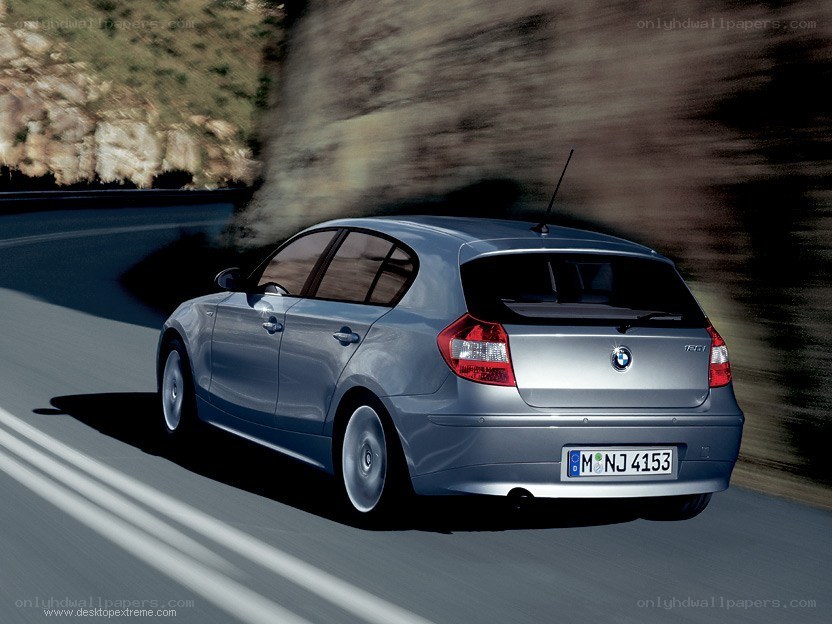 silver bmw driving on road