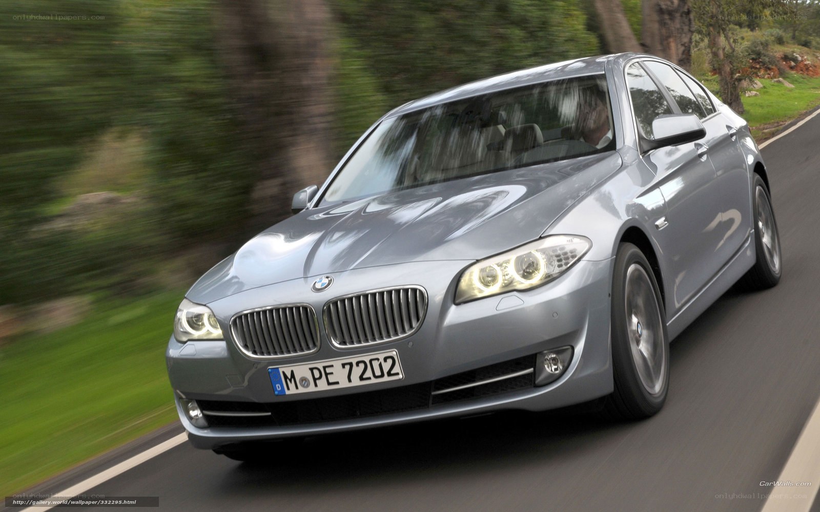 silver bmw driving on road