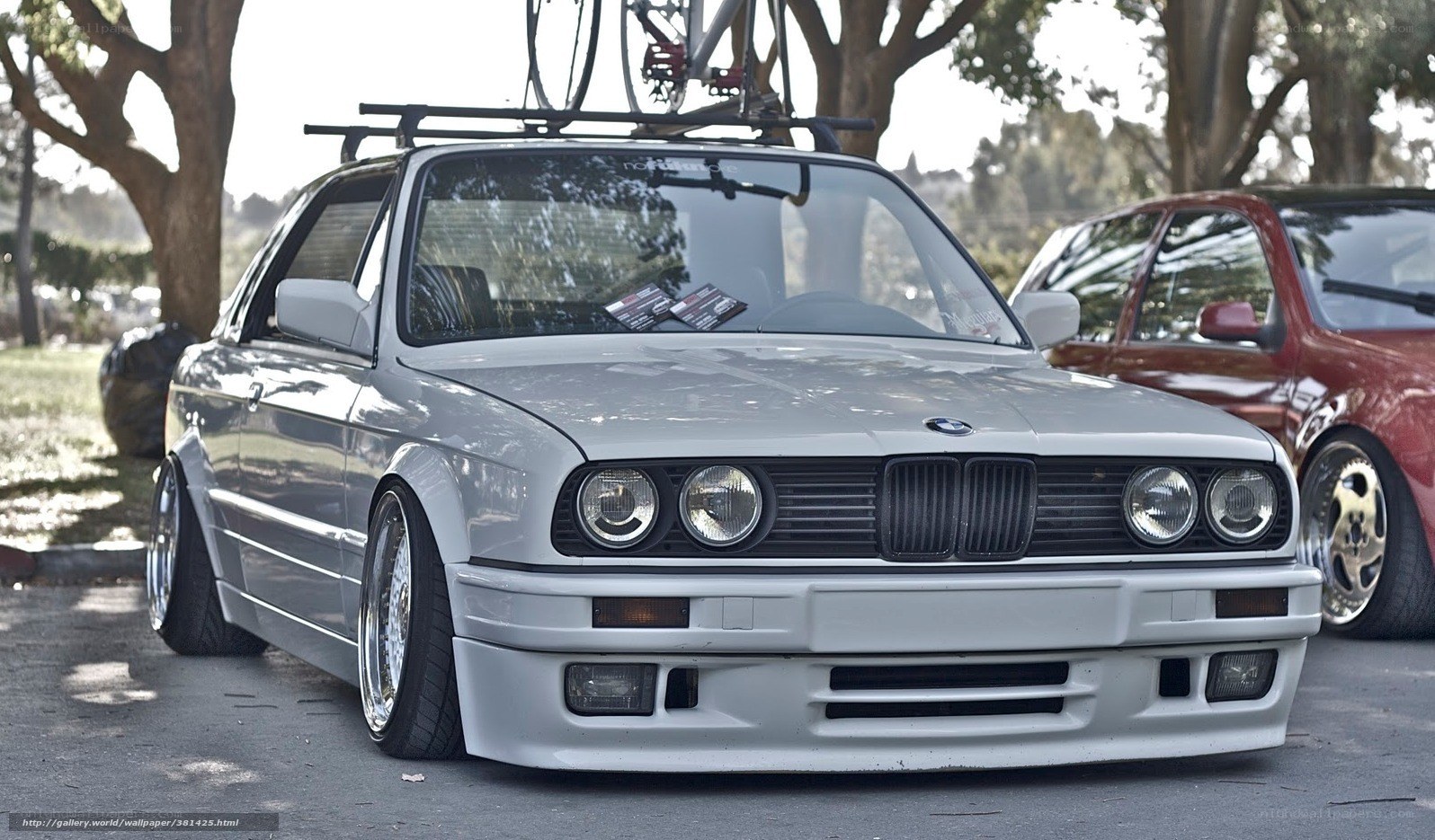 silver bmw e30 with bike rack