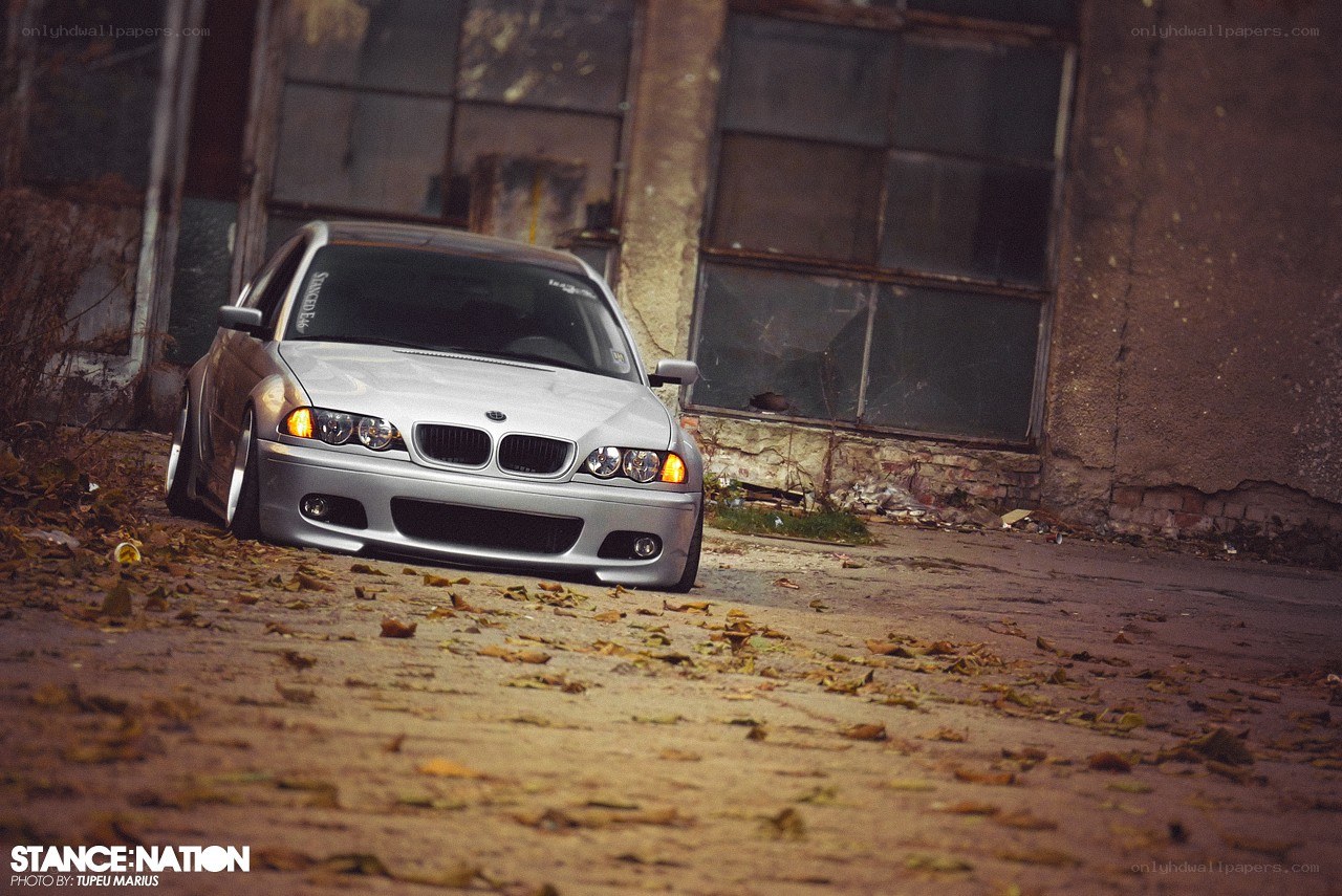silver bmw in abandoned lot