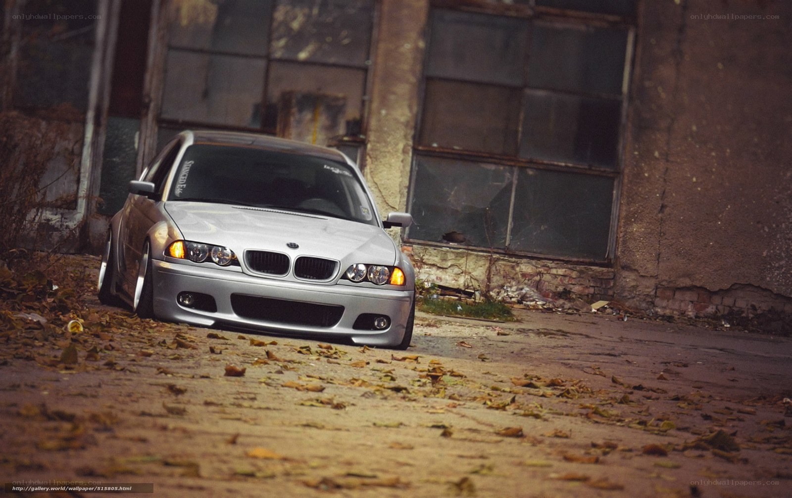 silver bmw in abandoned lot