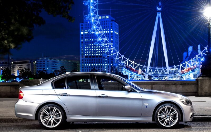 Silver BMW in London at night