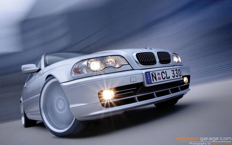 silver bmw in motion