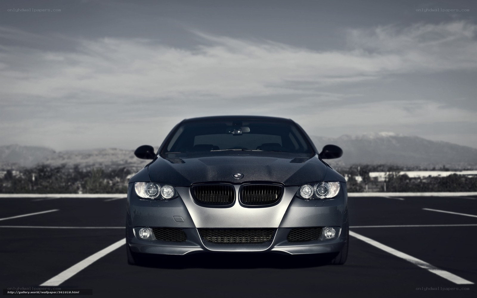 silver bmw in parking lot