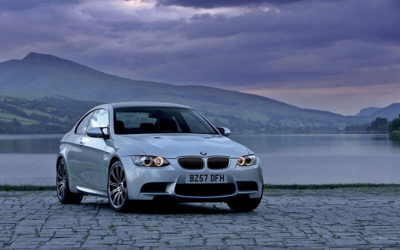 Silver BMW M3 by a lake