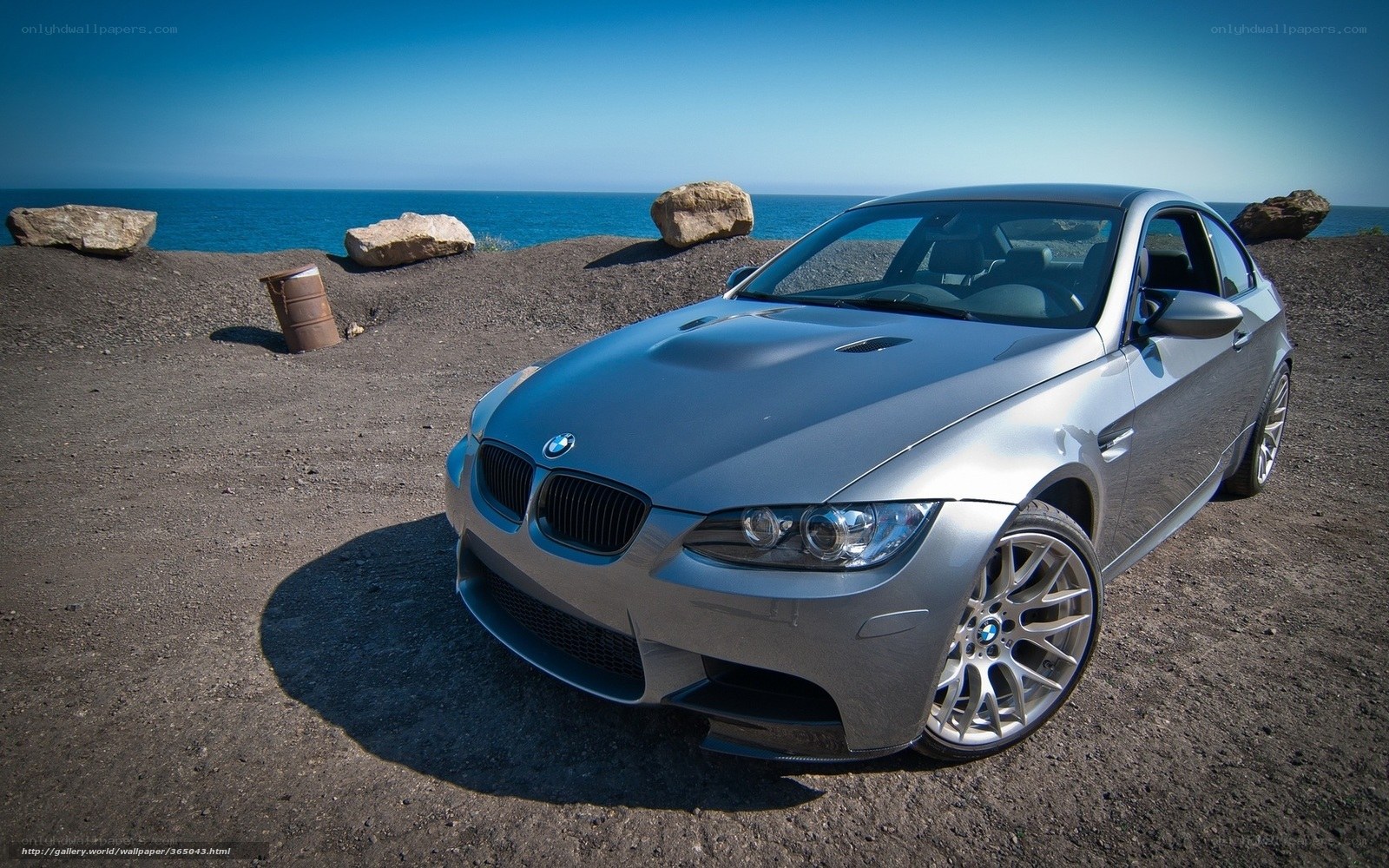 Silver BMW M3 by the sea