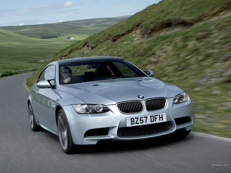 silver bmw m3 driving on country road
