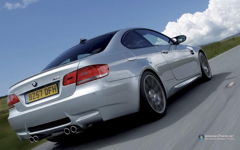 silver bmw m3 driving on road