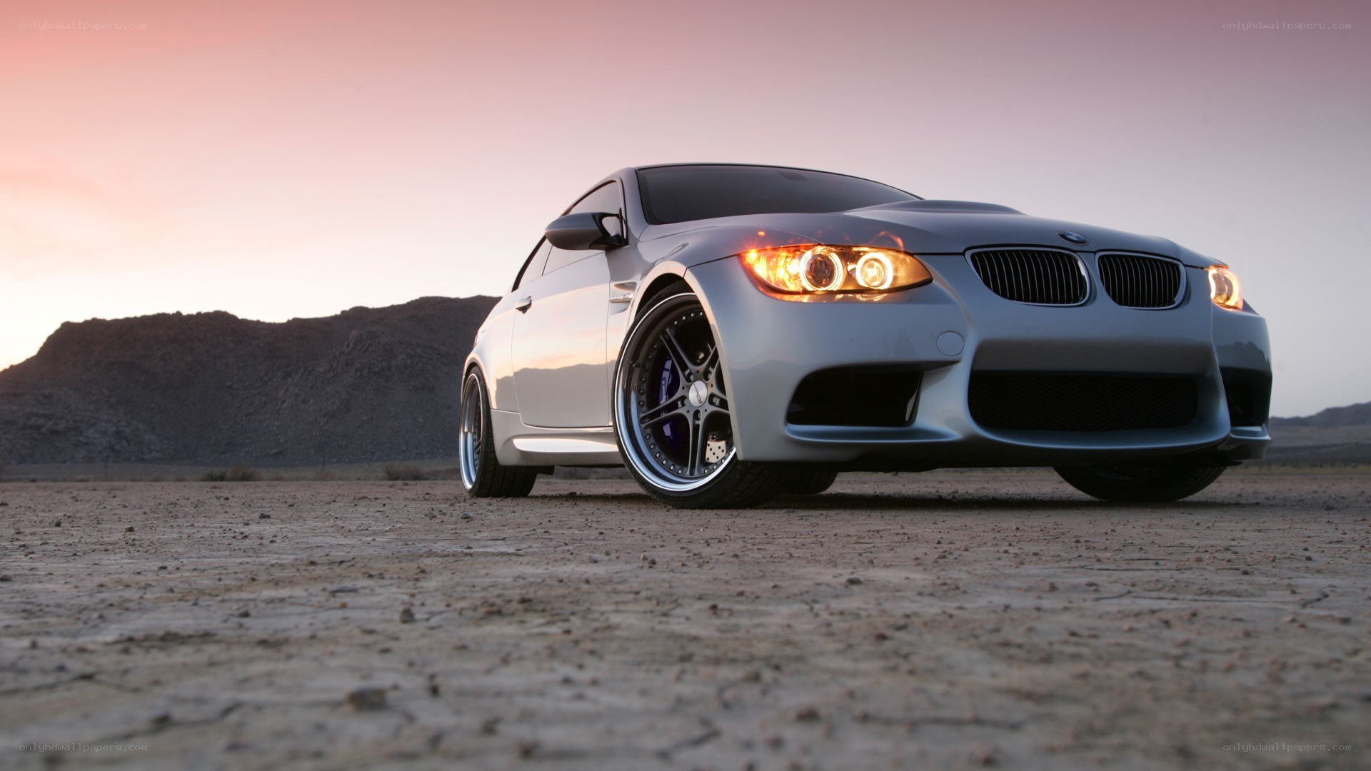 silver bmw m3 in desert