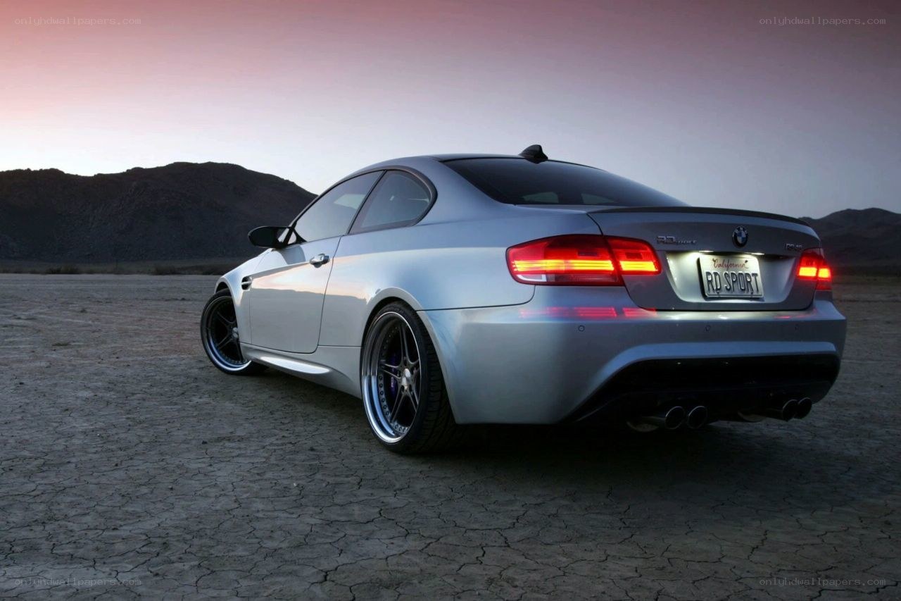 silver bmw m3 in desert