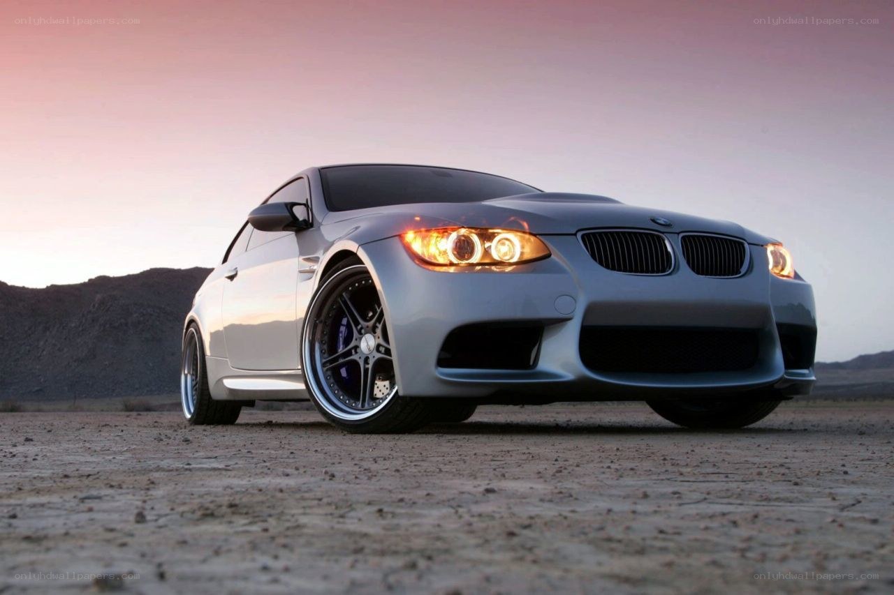 silver bmw m3 in desert