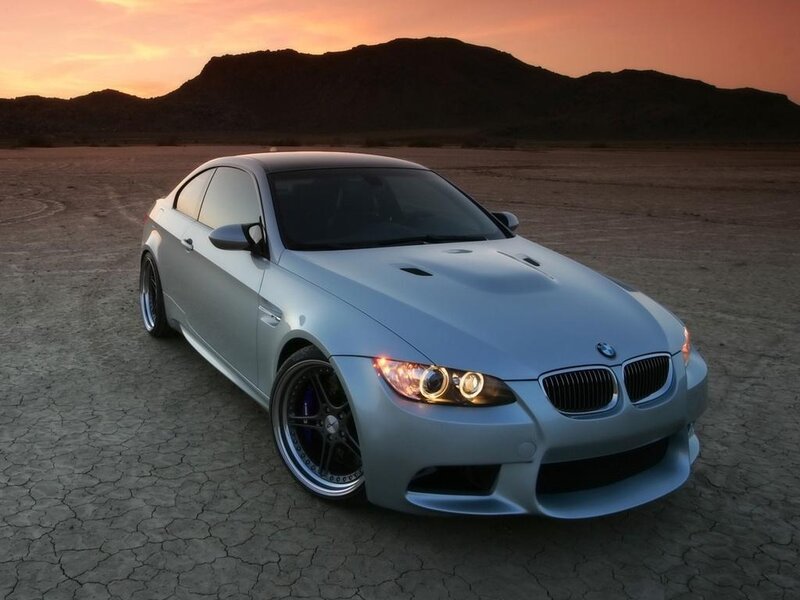 silver bmw m3 in desert