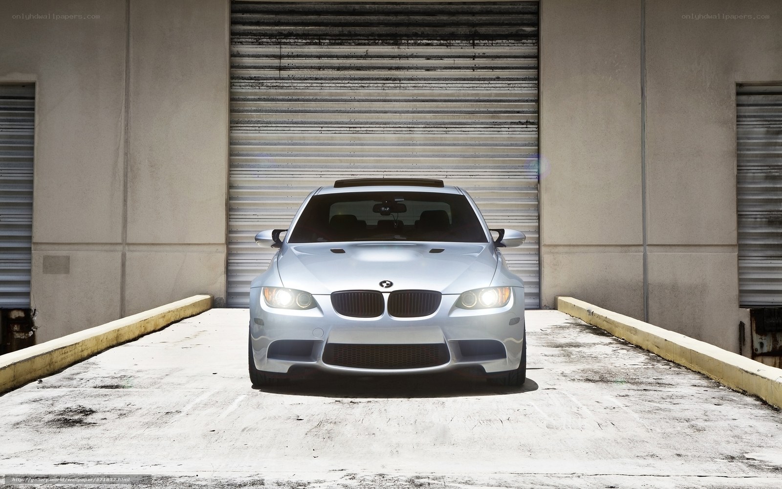 Silver BMW M3 in garage