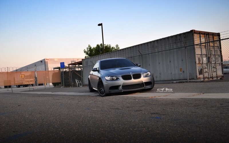 silver bmw m3 in industrial lot