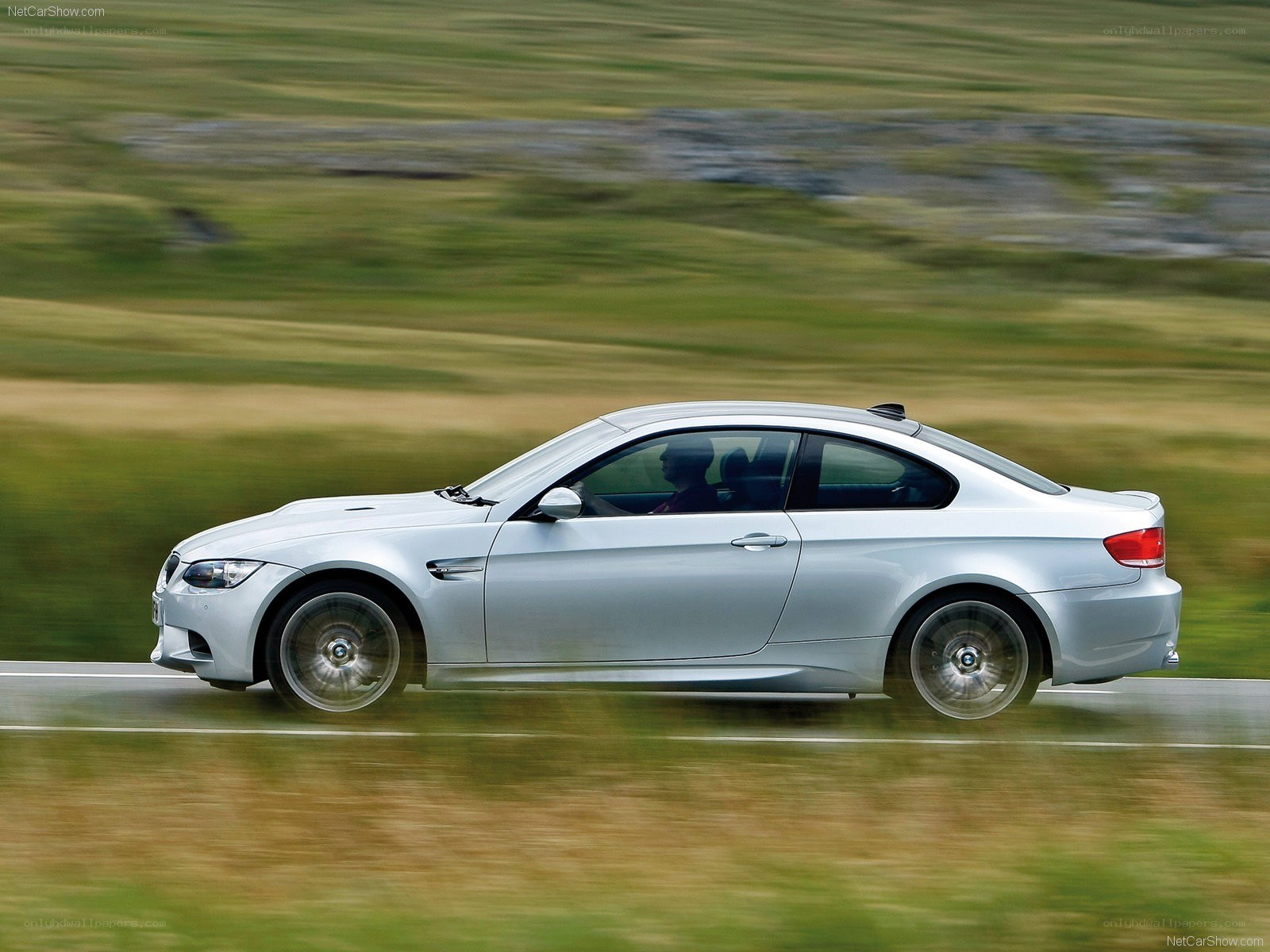 silver bmw m3 in motion
