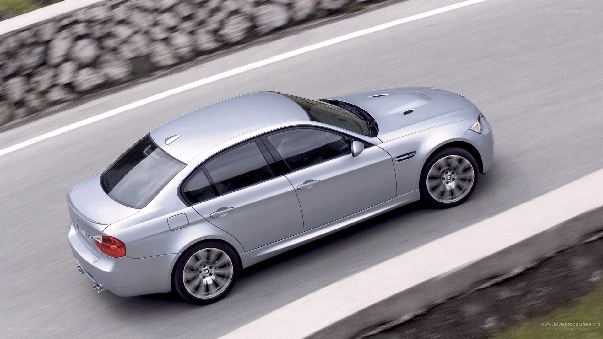 silver bmw m3 in motion
