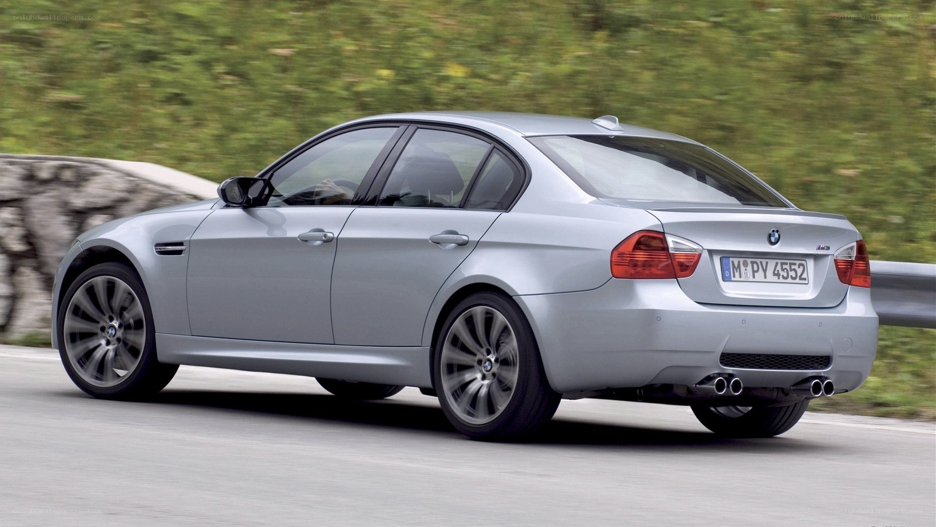 silver bmw m3 in motion