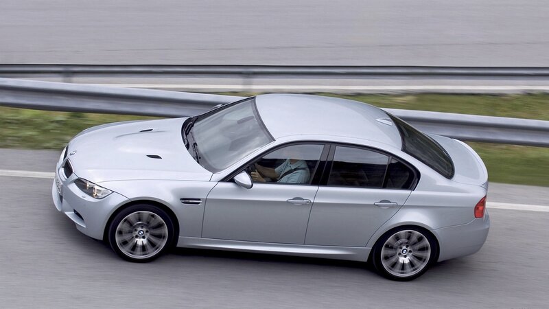 silver bmw m3 in motion