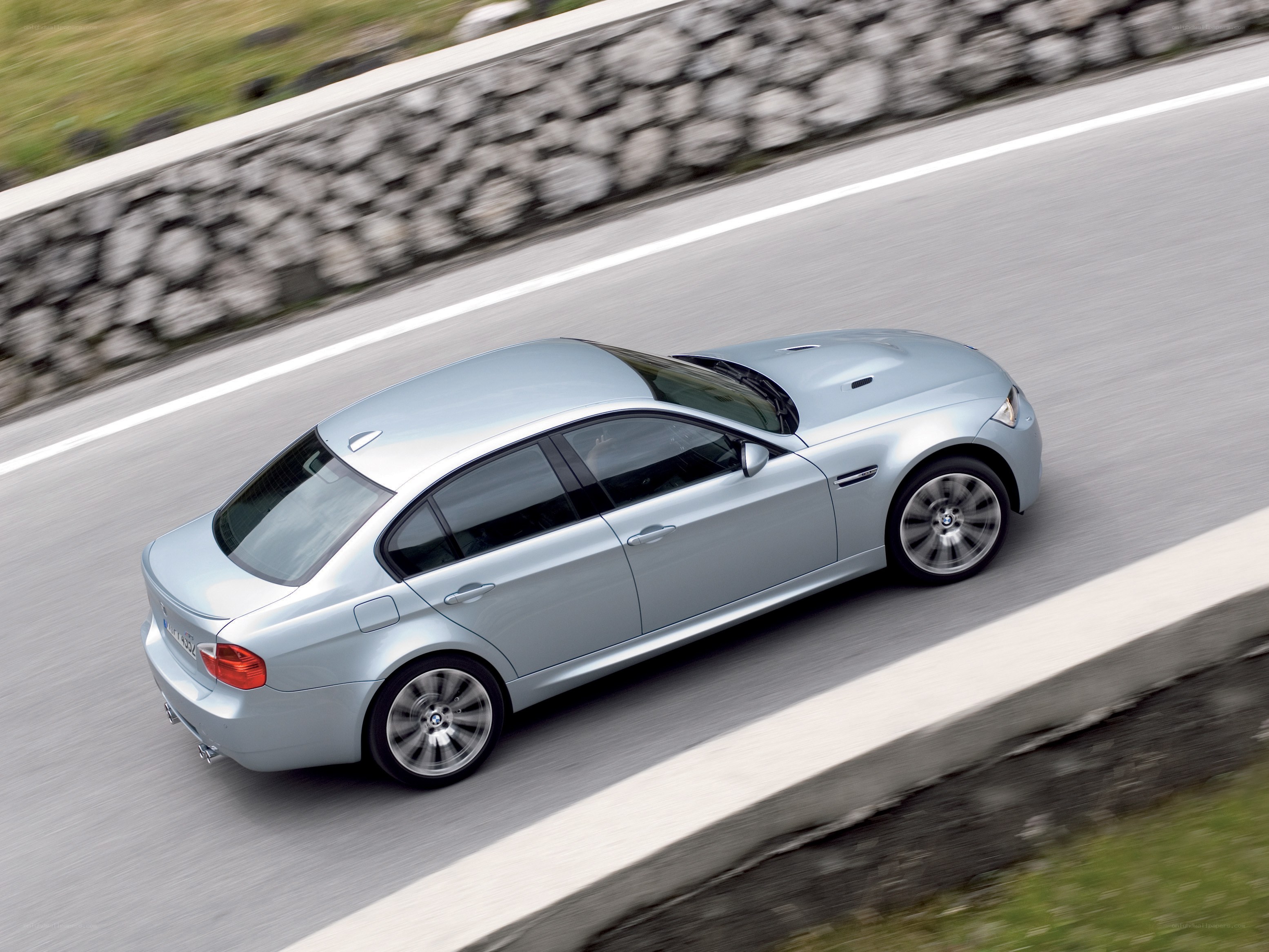 silver bmw m3 in motion