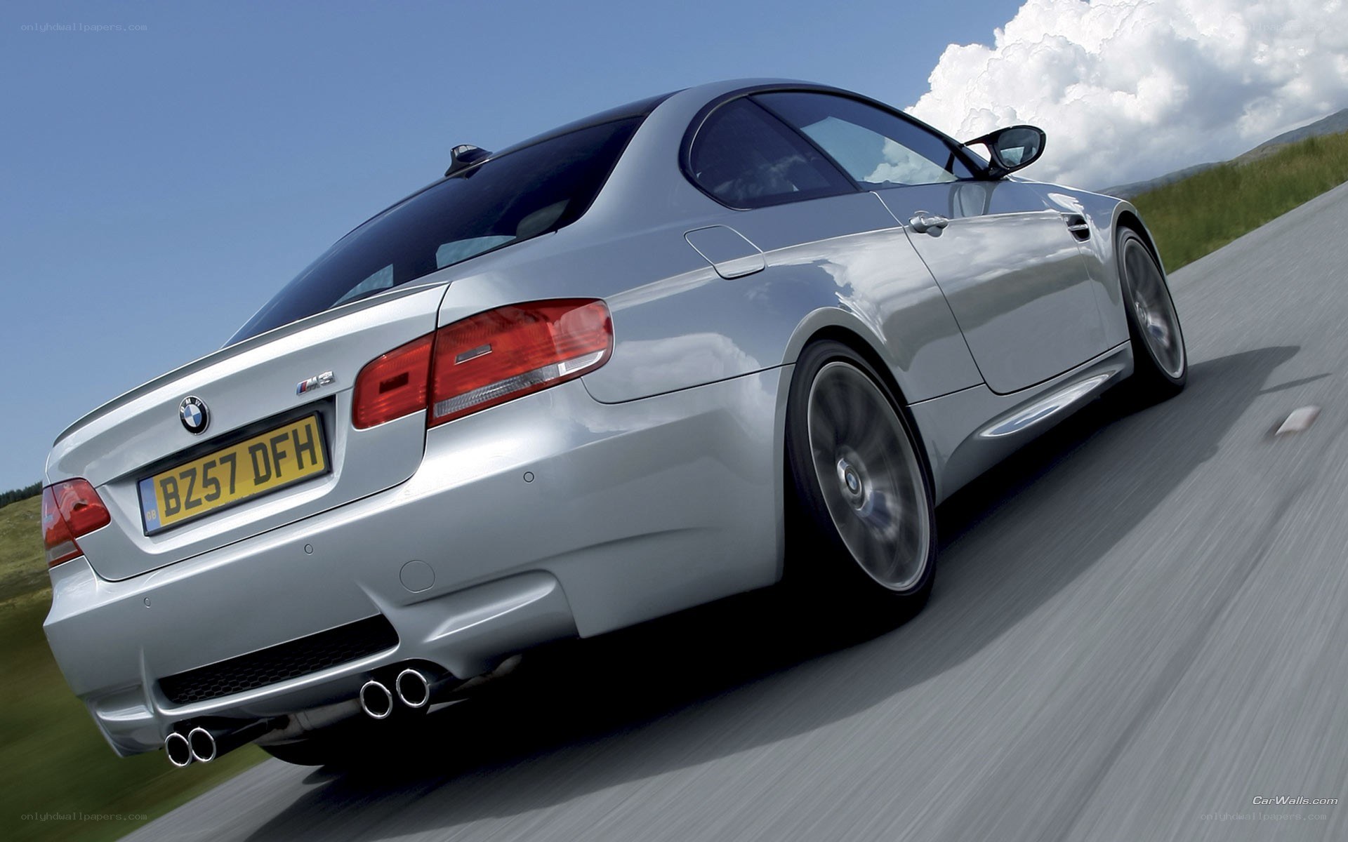 silver bmw m3 in motion