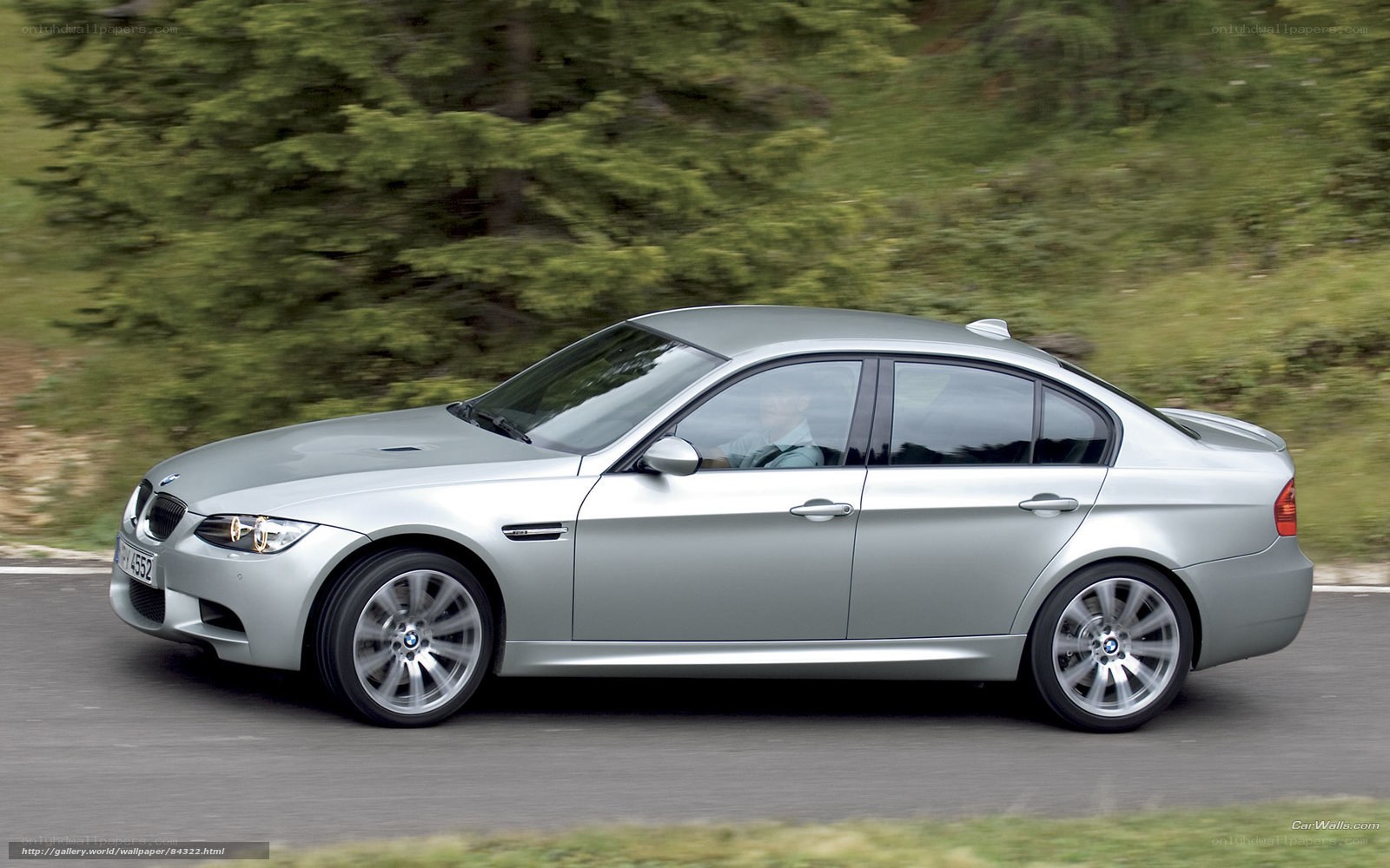 silver bmw m3 in motion