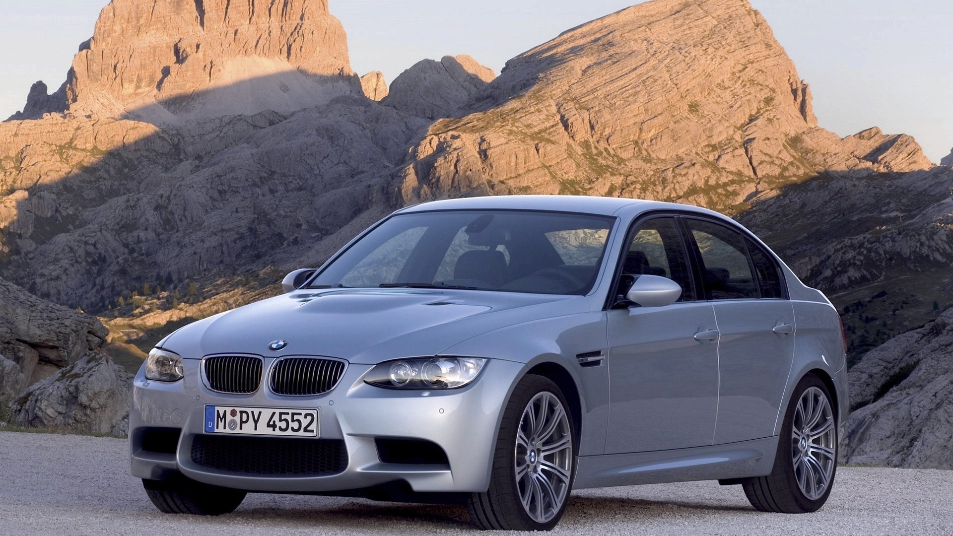 Silver BMW M3 in mountain setting