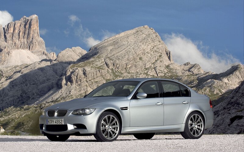 Silver BMW M3 in mountain setting