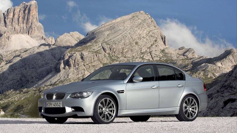 Silver BMW M3 in mountain setting
