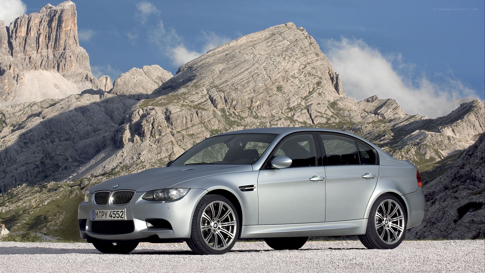 Silver BMW M3 in mountain setting