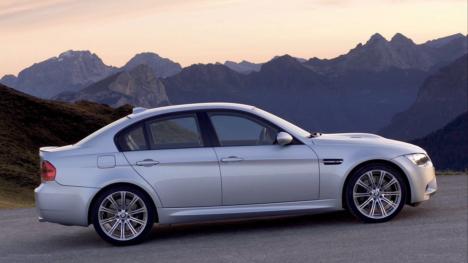 silver bmw m3 in mountains