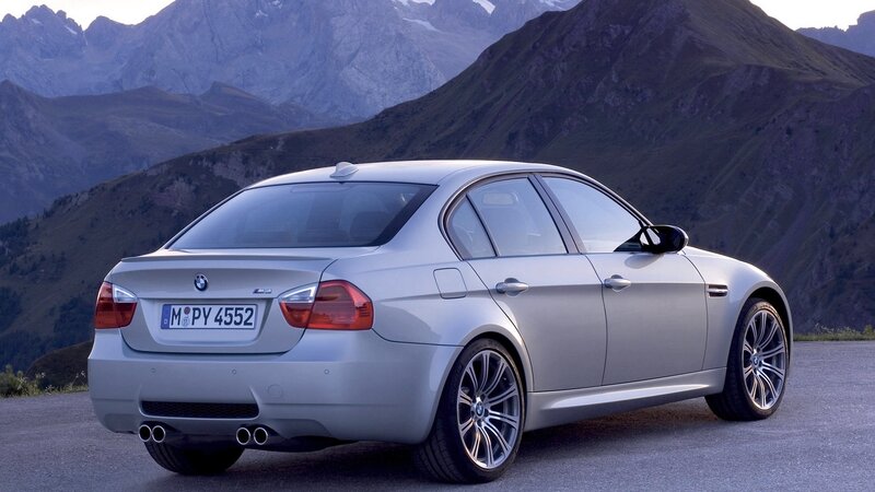 silver bmw m3 in mountains