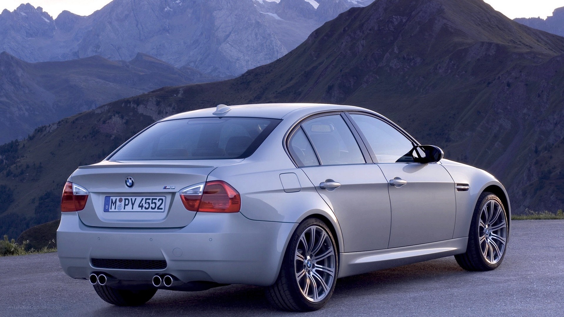 silver bmw m3 in mountains