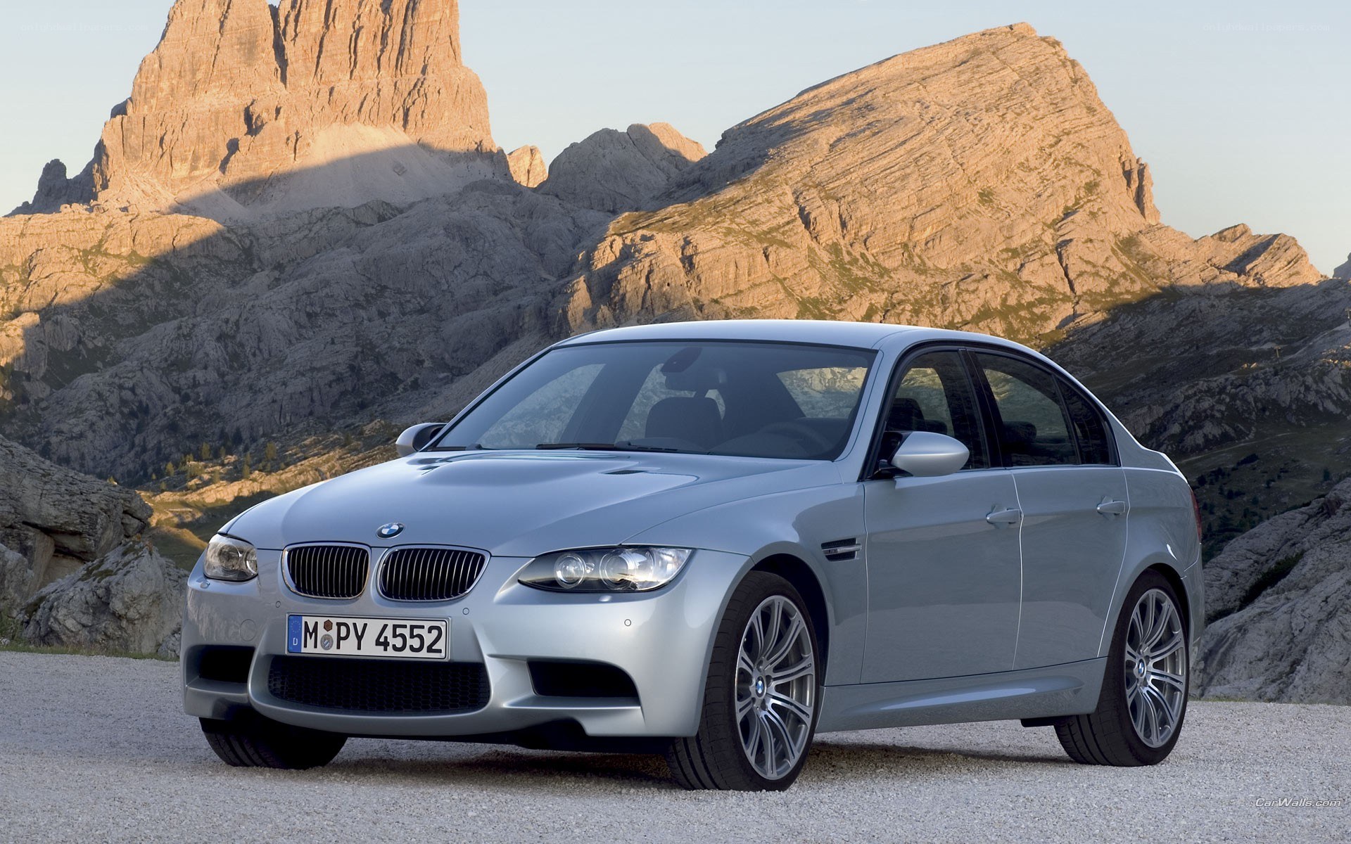 silver bmw m3 in mountains