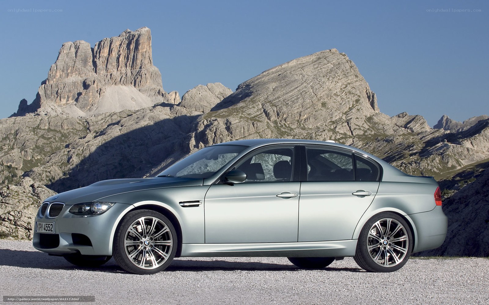 silver bmw m3 in mountains