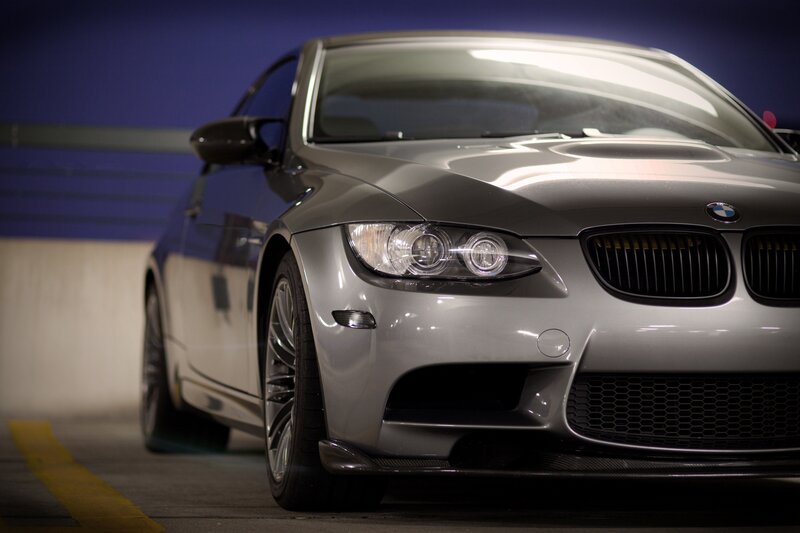 silver bmw m3 in parking garage