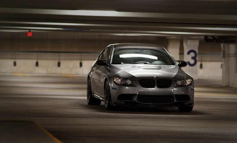 Silver BMW M3 in parking garage