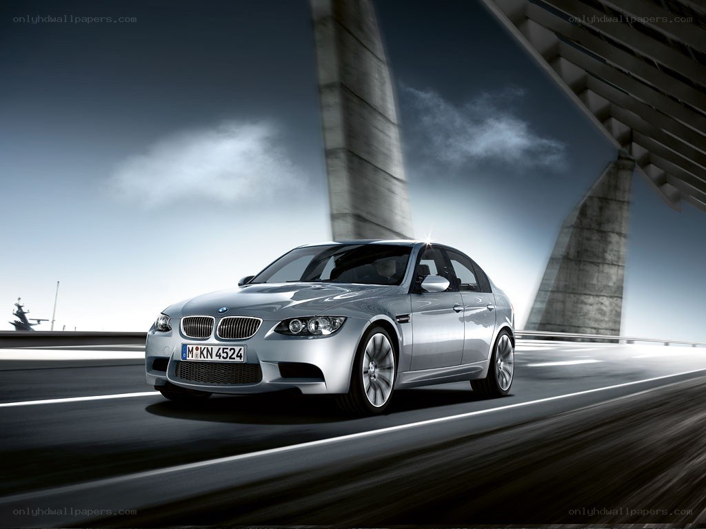 Silver BMW M3 on a bridge