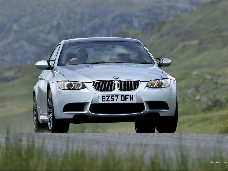 Silver BMW M3 on a mountain road