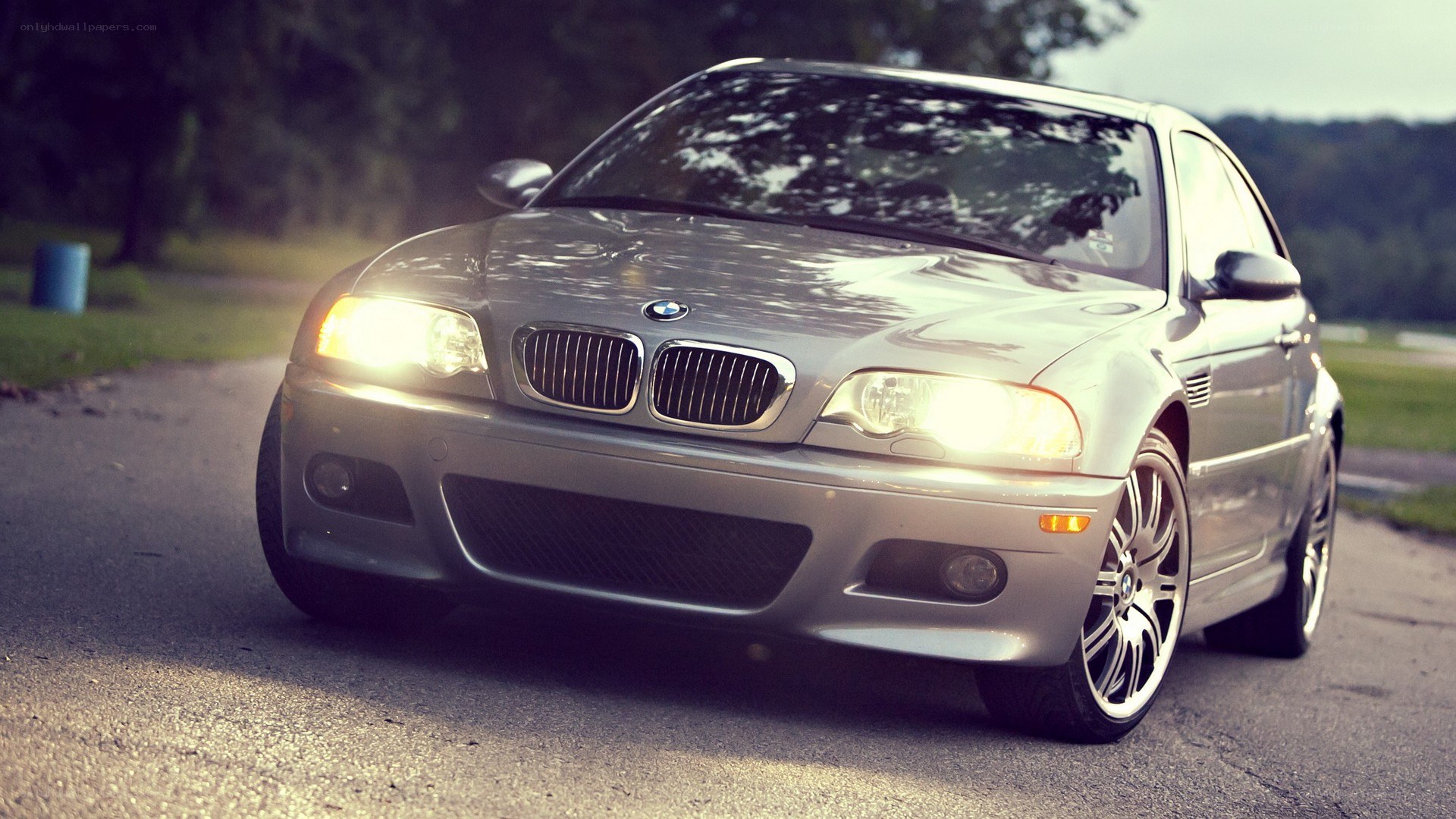 silver bmw m3 on a road