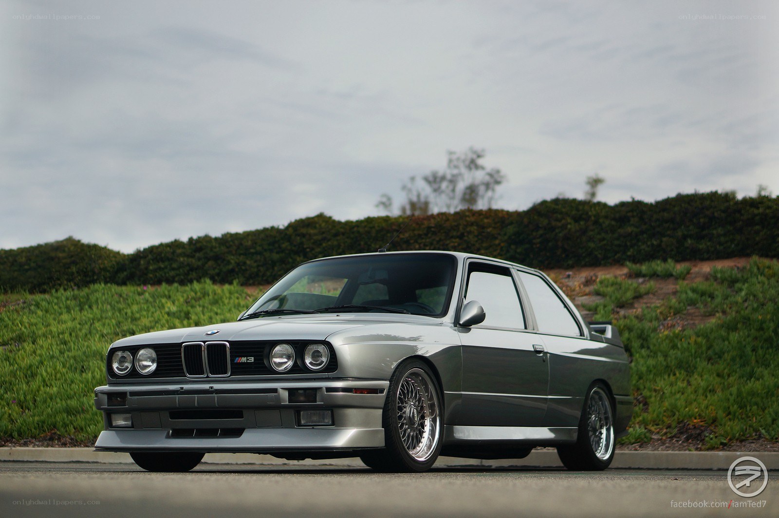 Silver BMW M3 on a road