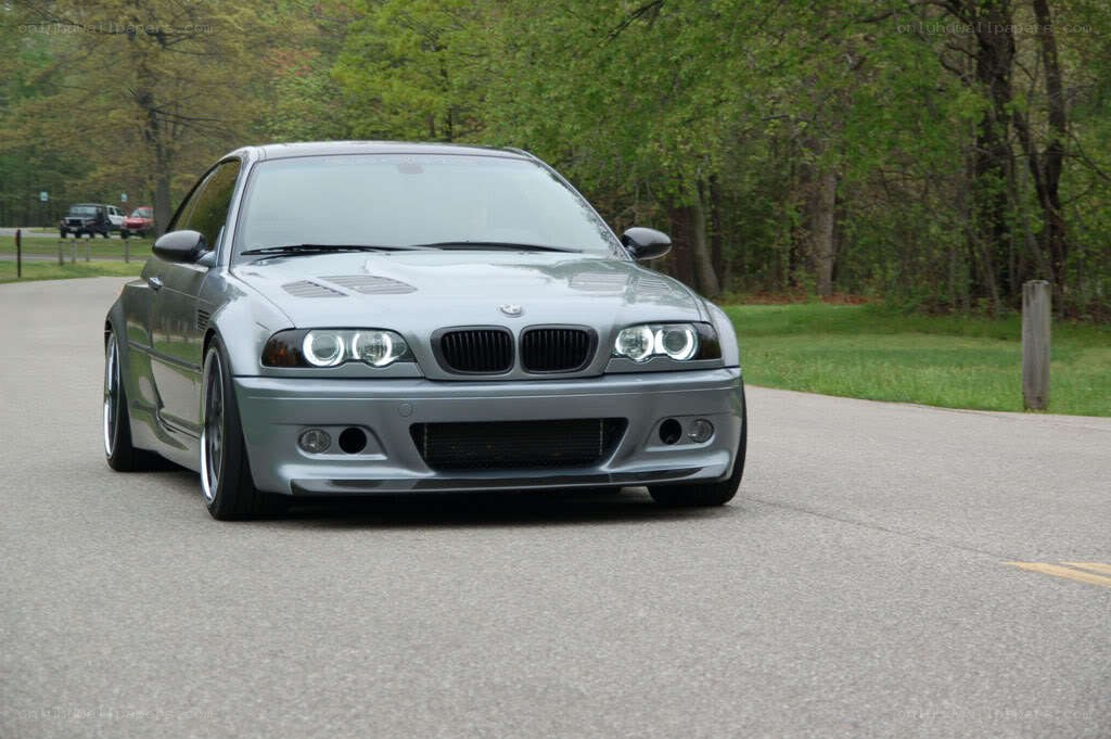 silver bmw m3 on a road