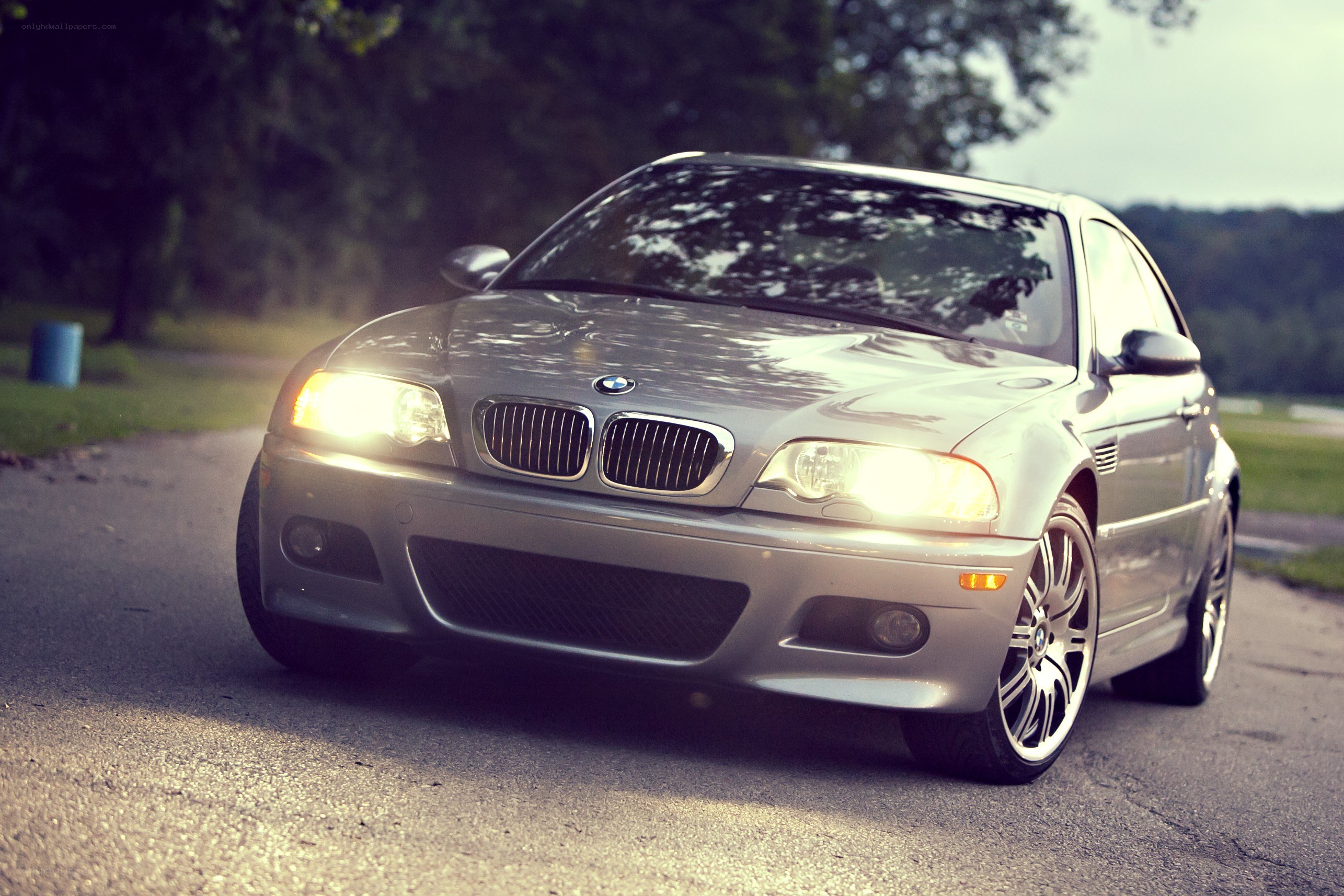 silver bmw m3 on a road