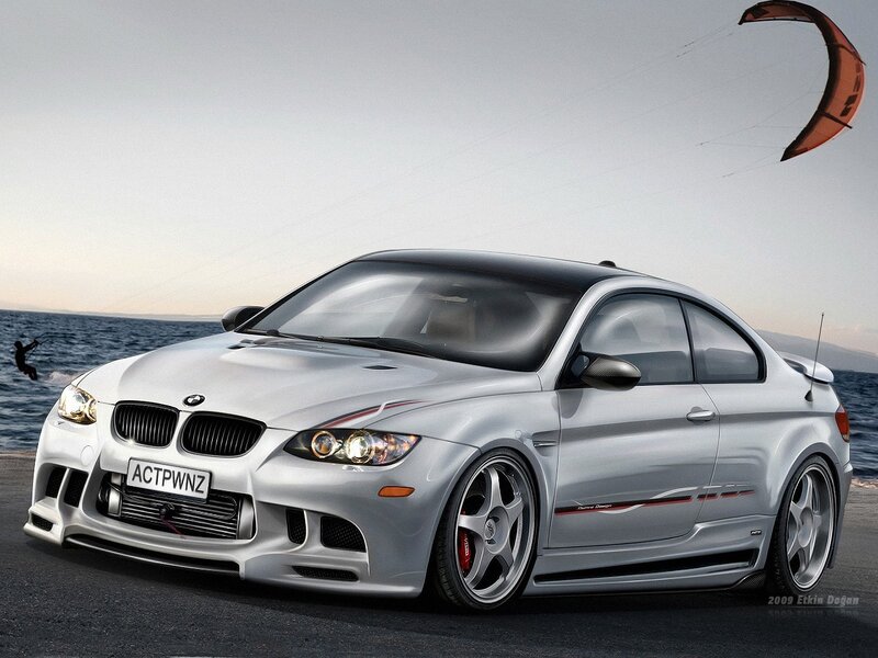 Silver BMW M3 on beach