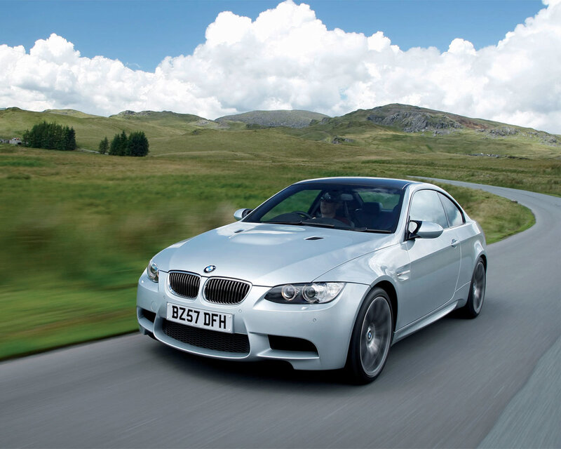silver bmw m3 on country road
