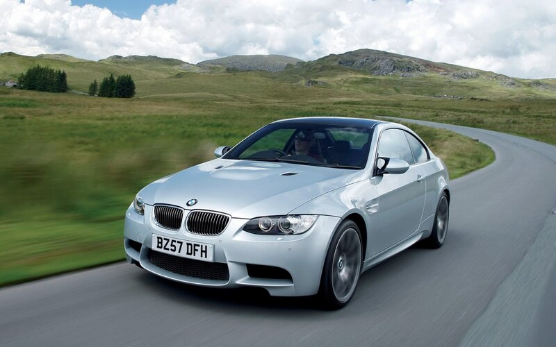silver bmw m3 on country road