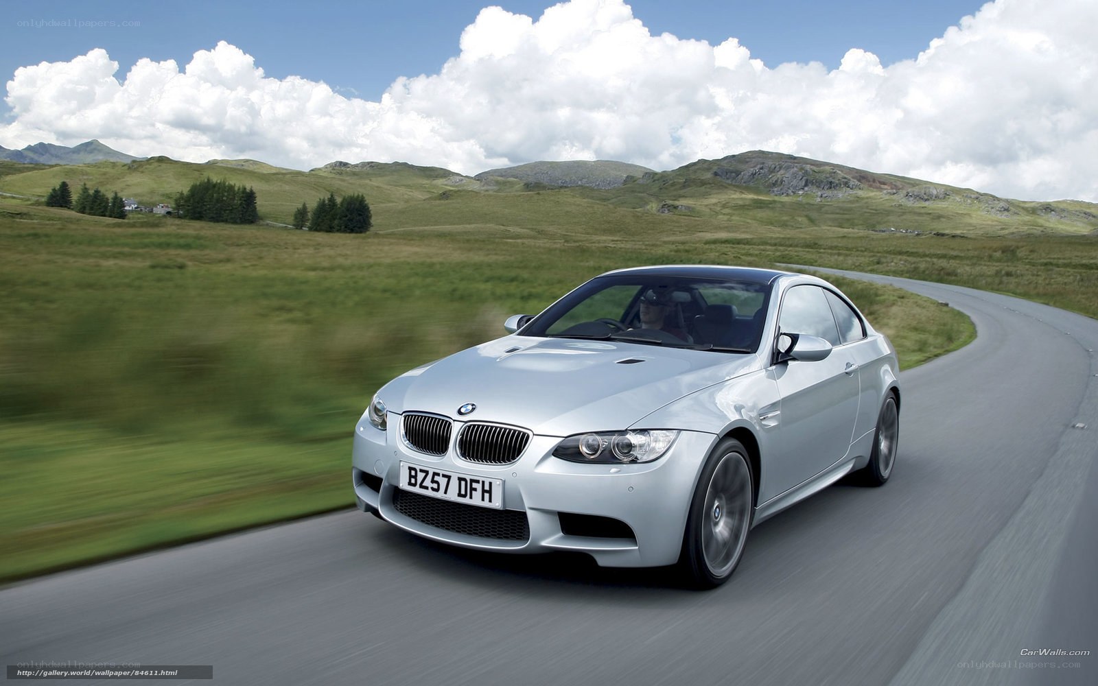 silver bmw m3 on country road