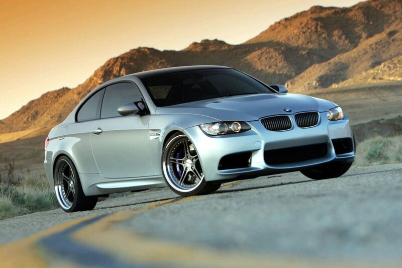 silver bmw m3 on desert road